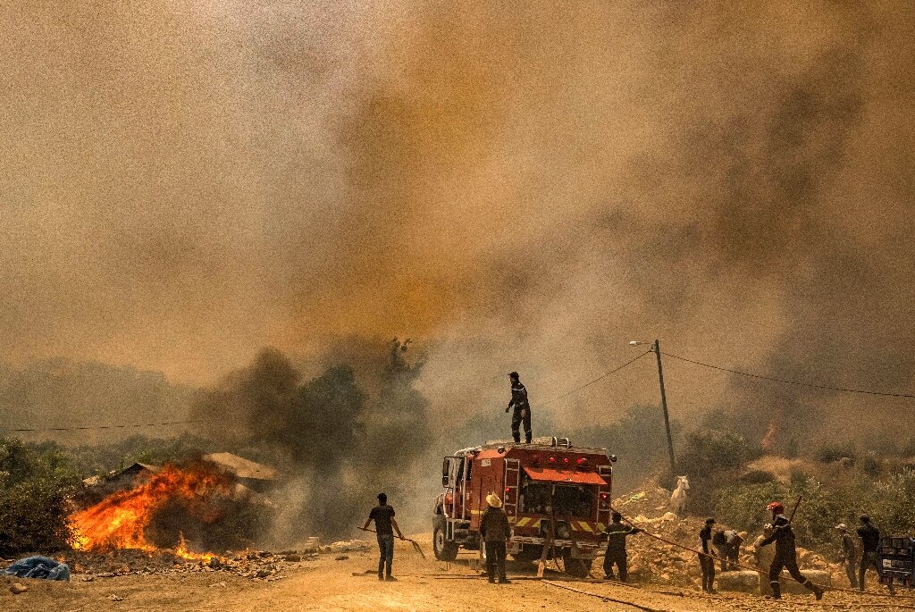 Firefighters and troops in Morocco combat a roaring fire as residents flee. Afro News Wire